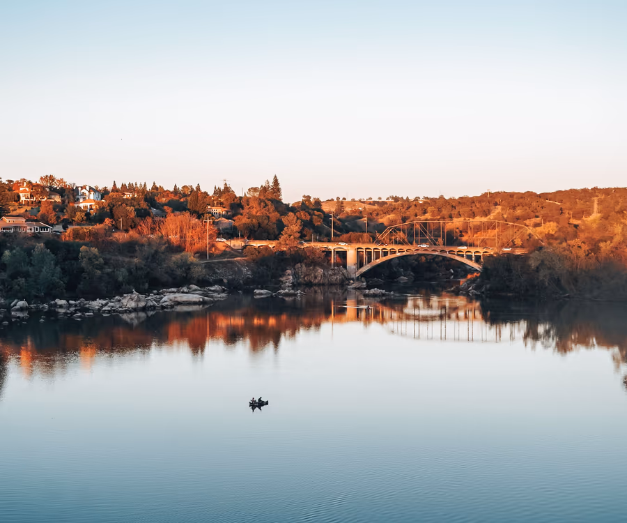 Lake Natoma and the Rainbow Bridge at sunset in Folsom, California
